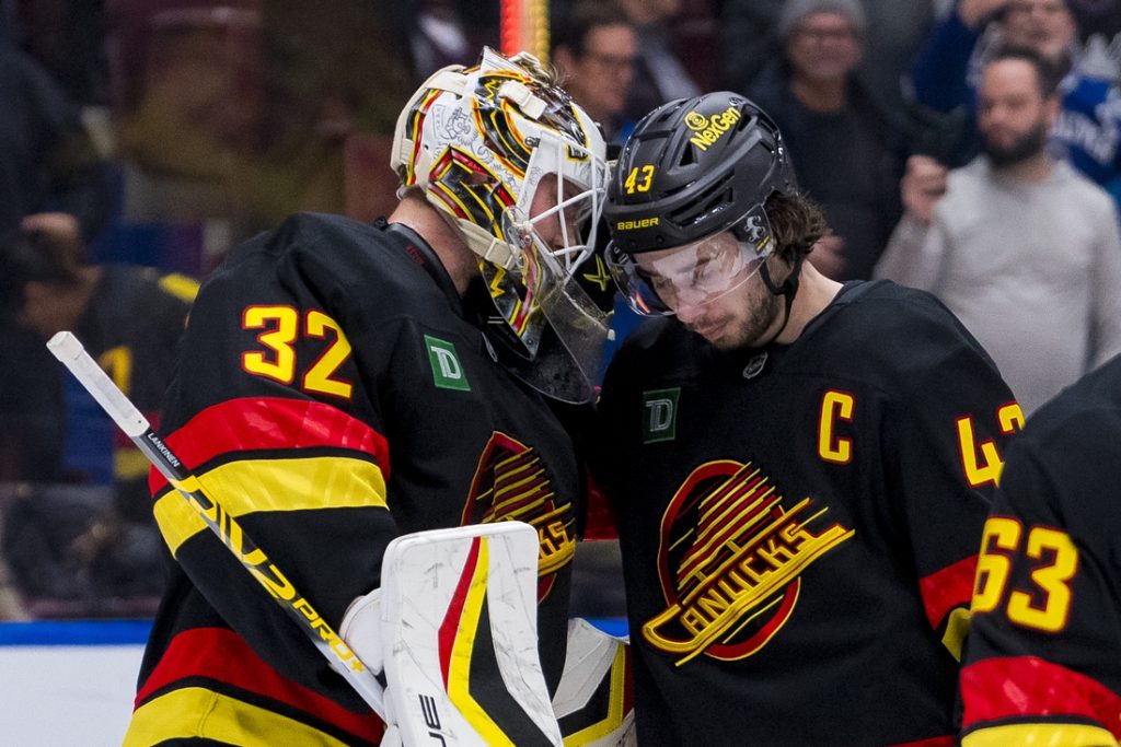 Quinn Hughes, Canucks end Caps' winning streak