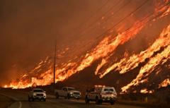 Thousands evacuated as new fast-growing fire ignites near Los Angeles