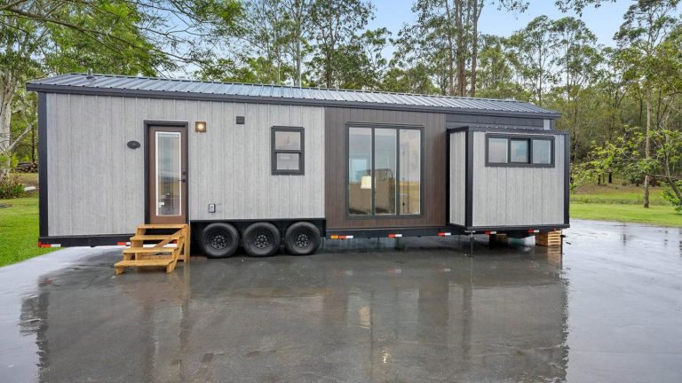 Sizable tiny house expands living space with triple slide-outs