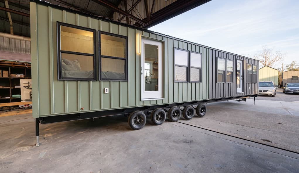 Huge duplex tiny house fits two homes on a single trailer